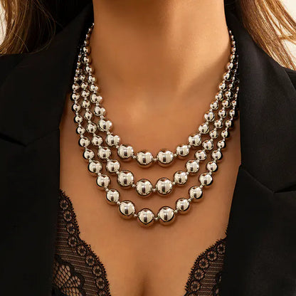 Exaggerated Layered Geometric Beaded Necklaces